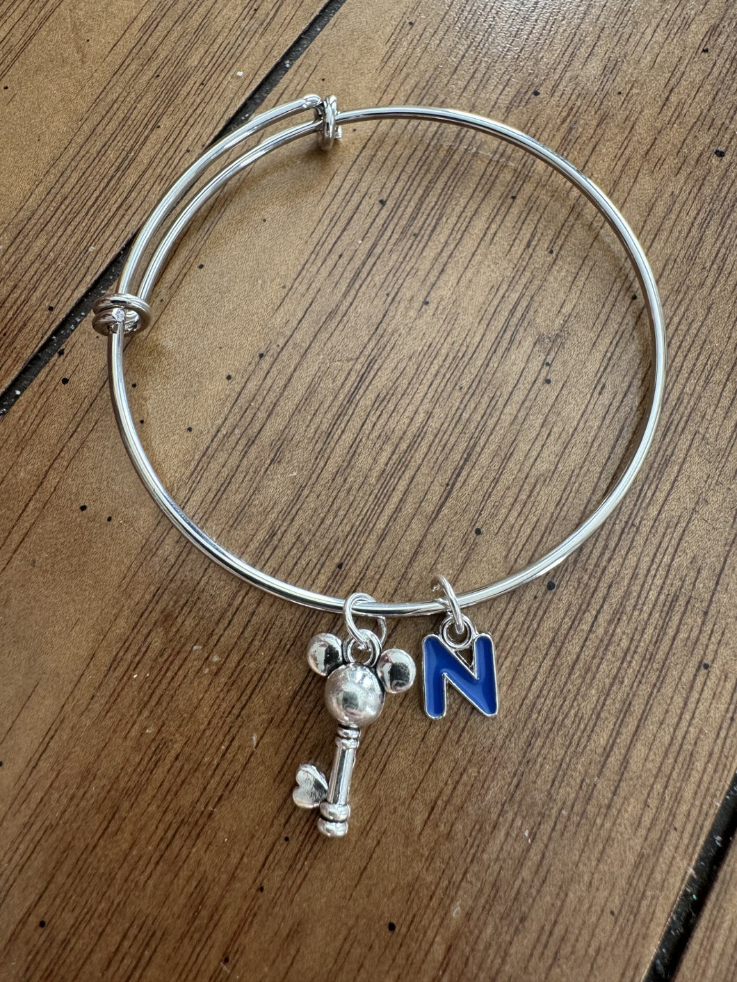 Silver bracelet with Mickey Key
